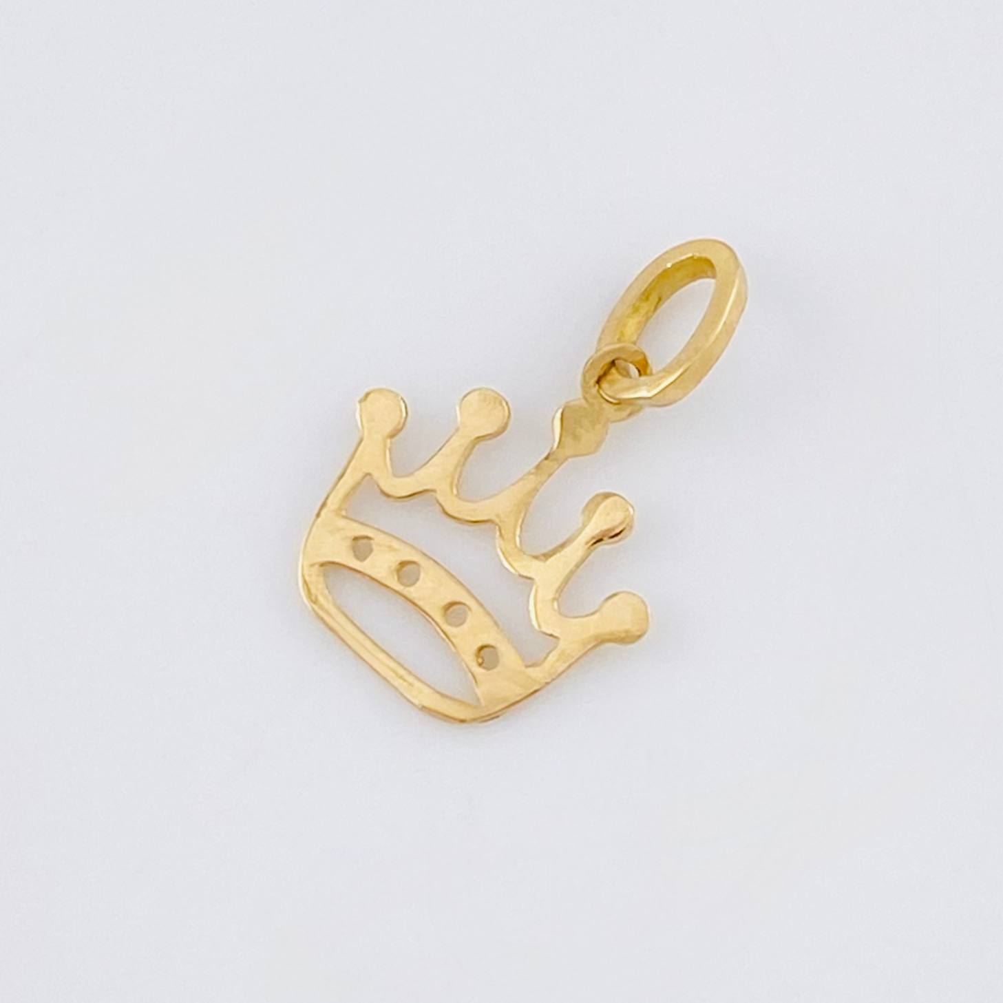 Dije Corona 0.2 g / 1/2 in Oro Amarillo 18K
