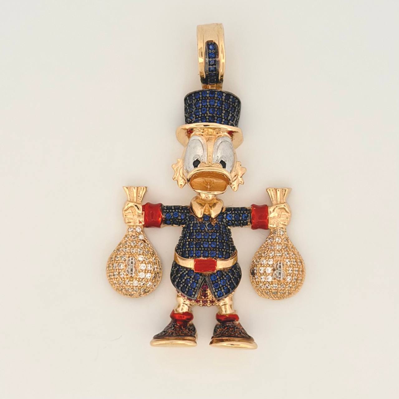 Dije Pato Bolsas Dinero 9.55gr / 1 1/2 in / Oro Amarillo 18K