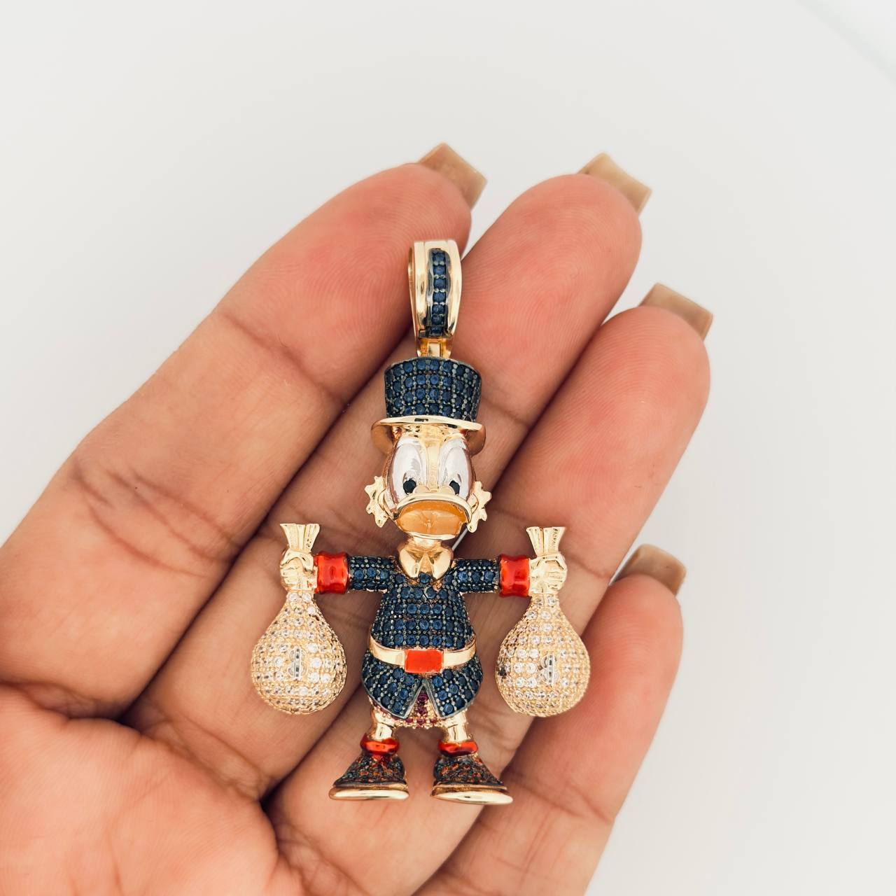 Dije Pato Bolsas De Dinero 15.4gr / 2 1/4 in / Dos Oros Amarillo Blanco 18K ©