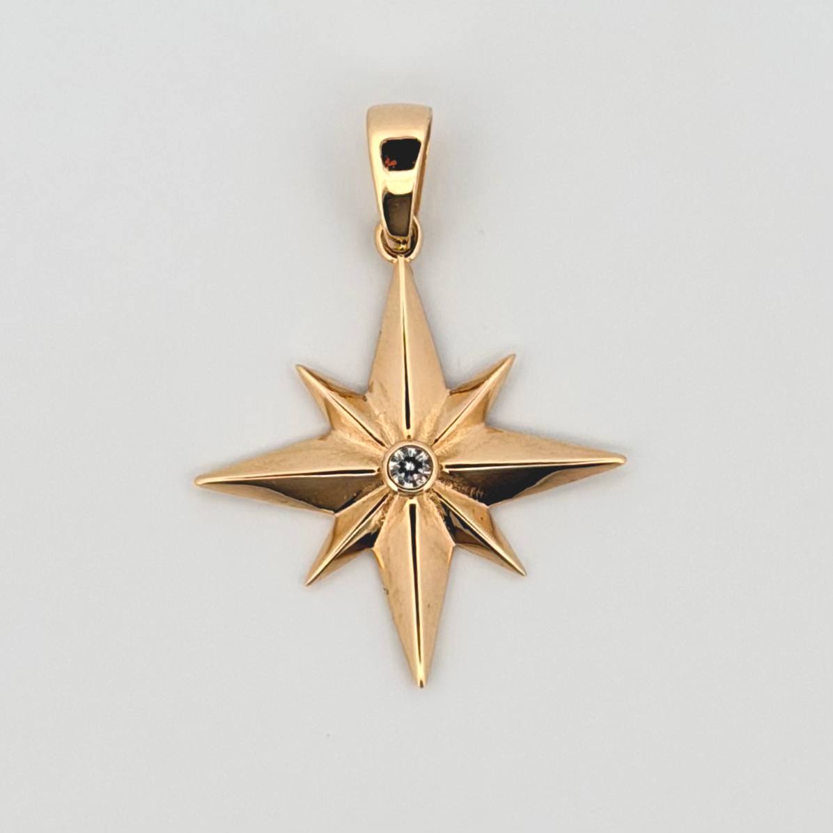 Dije Estrella 8 Puntas 2.6gr / 1 1/4 in / Oro Amarillo 18K ©