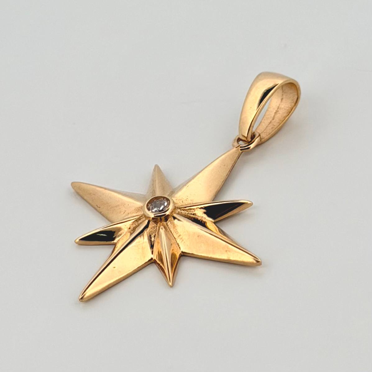 Dije Estrella 8 Puntas 2.6gr / 1 1/4 in / Oro Amarillo 18K ©