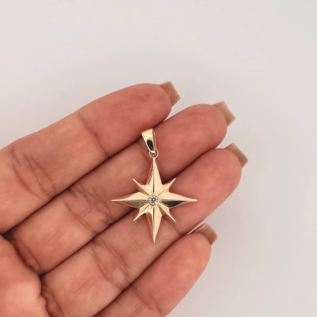 Dije Estrella 8 Puntas 2.6gr / 1 1/4 in / Oro Amarillo 18K ©