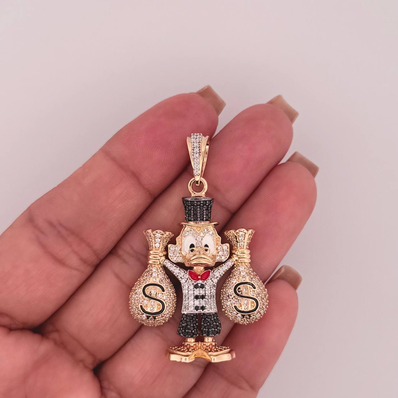 Dije Pato Bolsas Dinero 15.2gr / 2 in / Oro Amarillo 18K