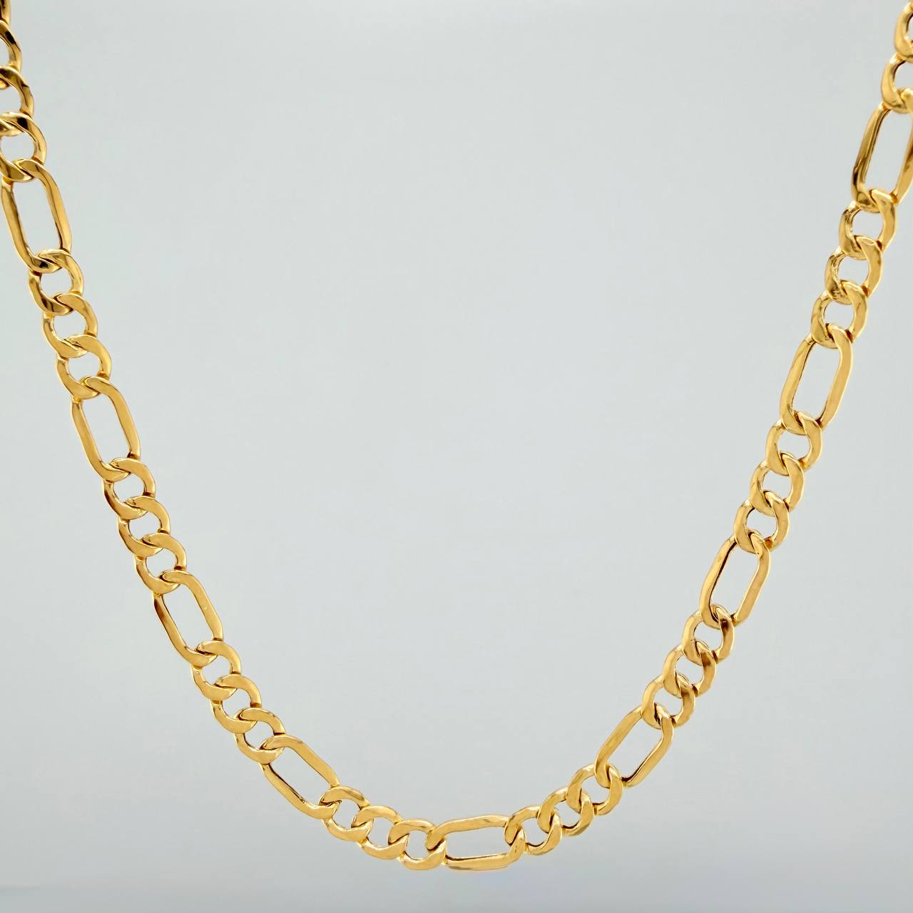 Cadena Figaro 7.95gr / 23 1/2 in / 4mm Oro Amarillo +1 18K %