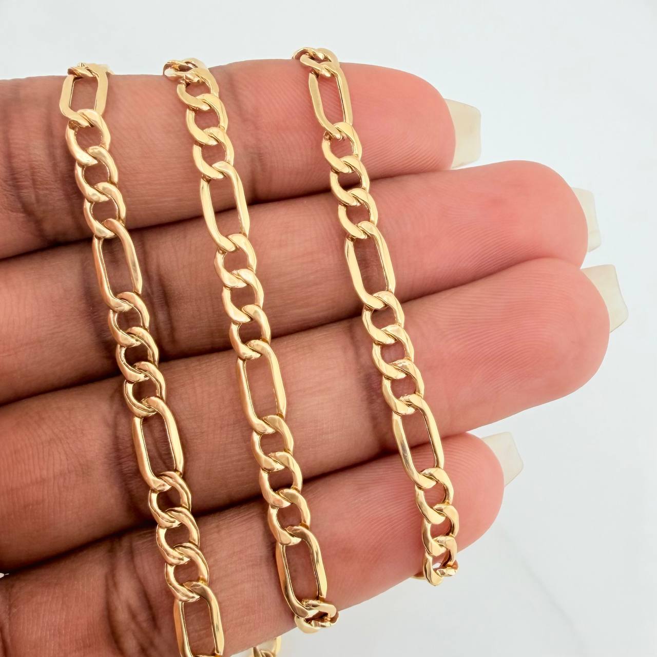 Cadena Figaro 8.05gr / 23 1/2 in / 4mm Oro Amarillo +1 18K %