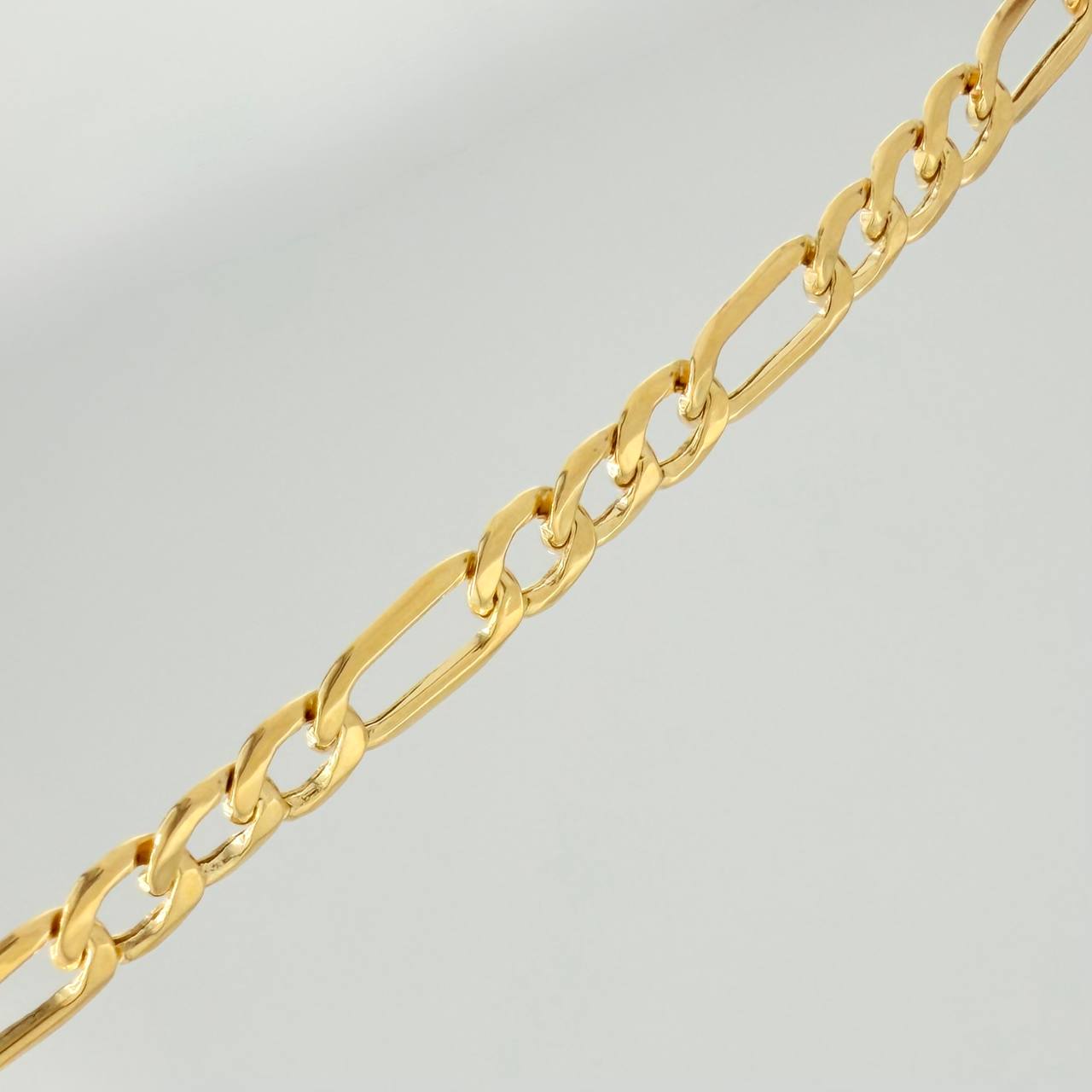 Cadena Figaro 7.95gr / 23 1/2 in / 4mm Oro Amarillo +1 18K %