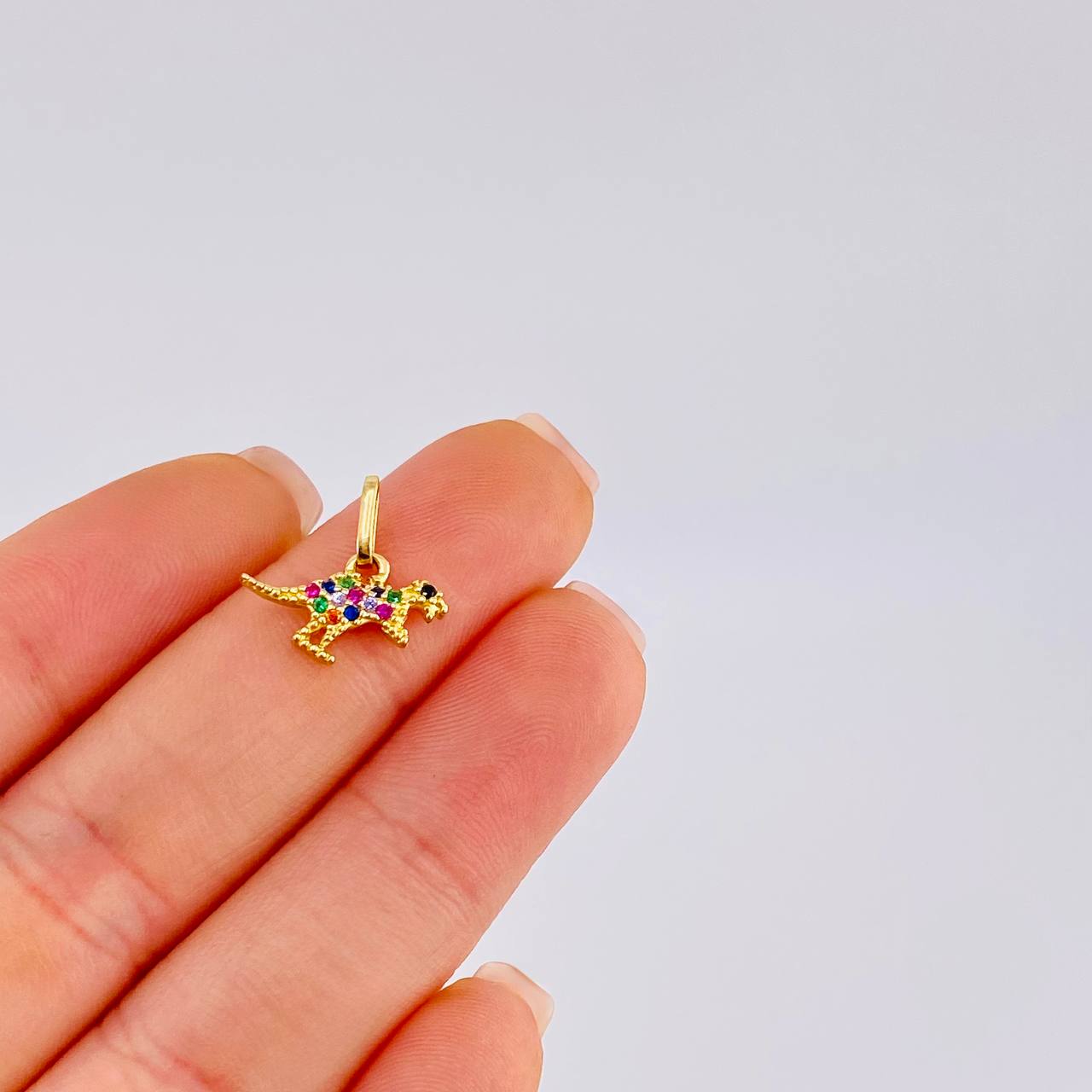 Dije Dinosuario 0.8 g / 1/2 in Oro Amarillo 18K