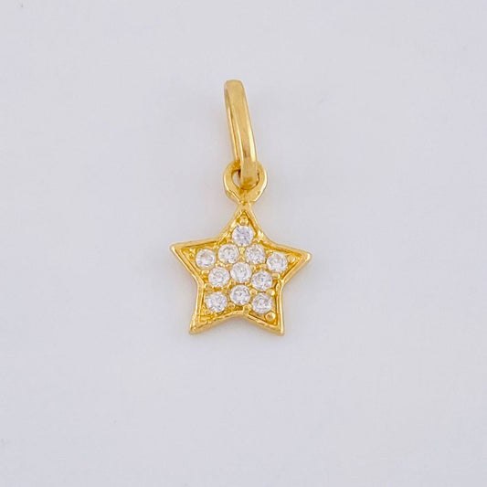 Dije Estrella 0.55 g / 1/2 in Oro Amarillo 18K