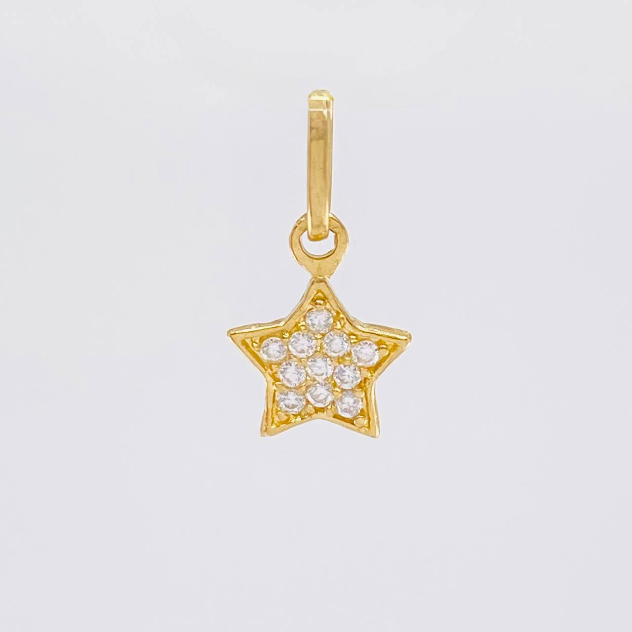 Dije Estrella 0.55 g / 1/2 in Oro Amarillo 18K