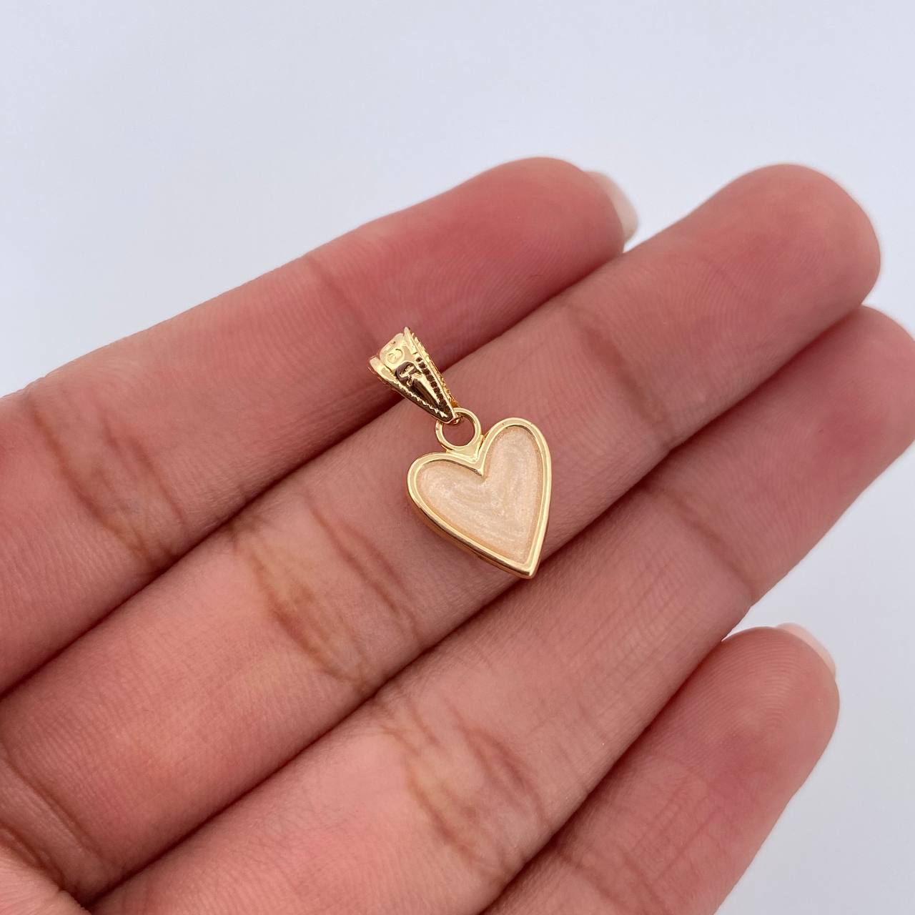 Dije Corazon 0.6gr / 1.7cm / Oro Amarillo 18K &