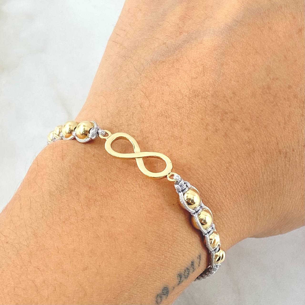 Gray Bracelet Charm Infinity 2.1gr / 18K Yellow Gold ©