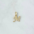 Dije Letra M Cursiva 0.5gr / 3/4 in / Oro Amarillo 18K ©