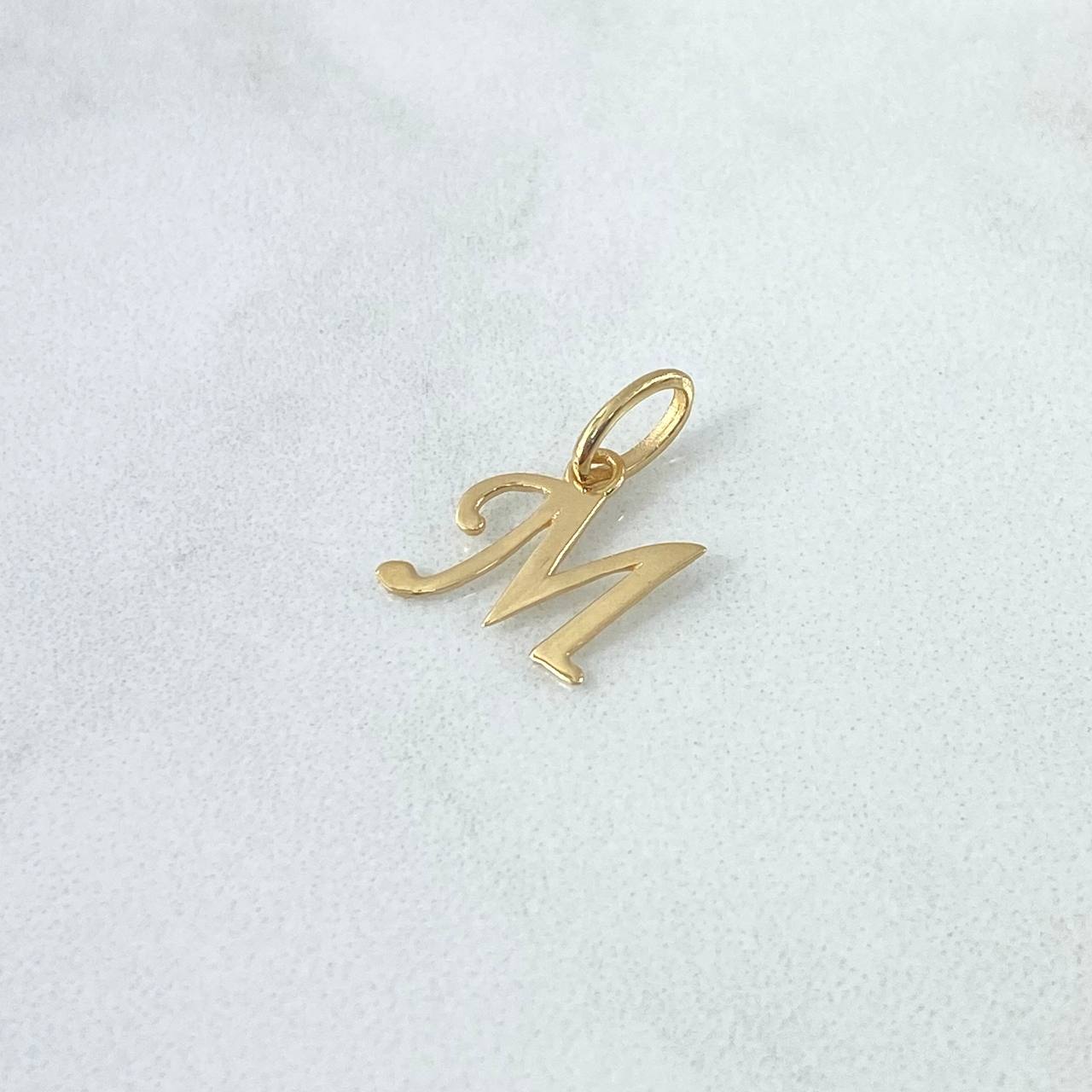 Dije Letra M Cursiva 0.5gr / 3/4 in / Oro Amarillo 18K ©
