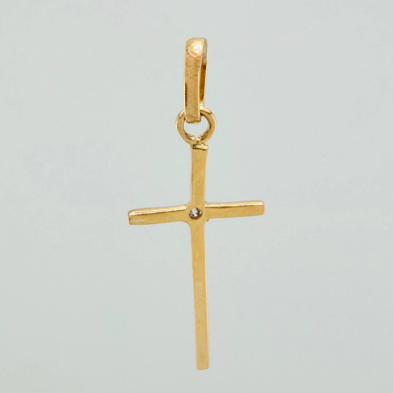 Dije Cruz 0.65gr / 1 in / Oro Amarillo 18K %