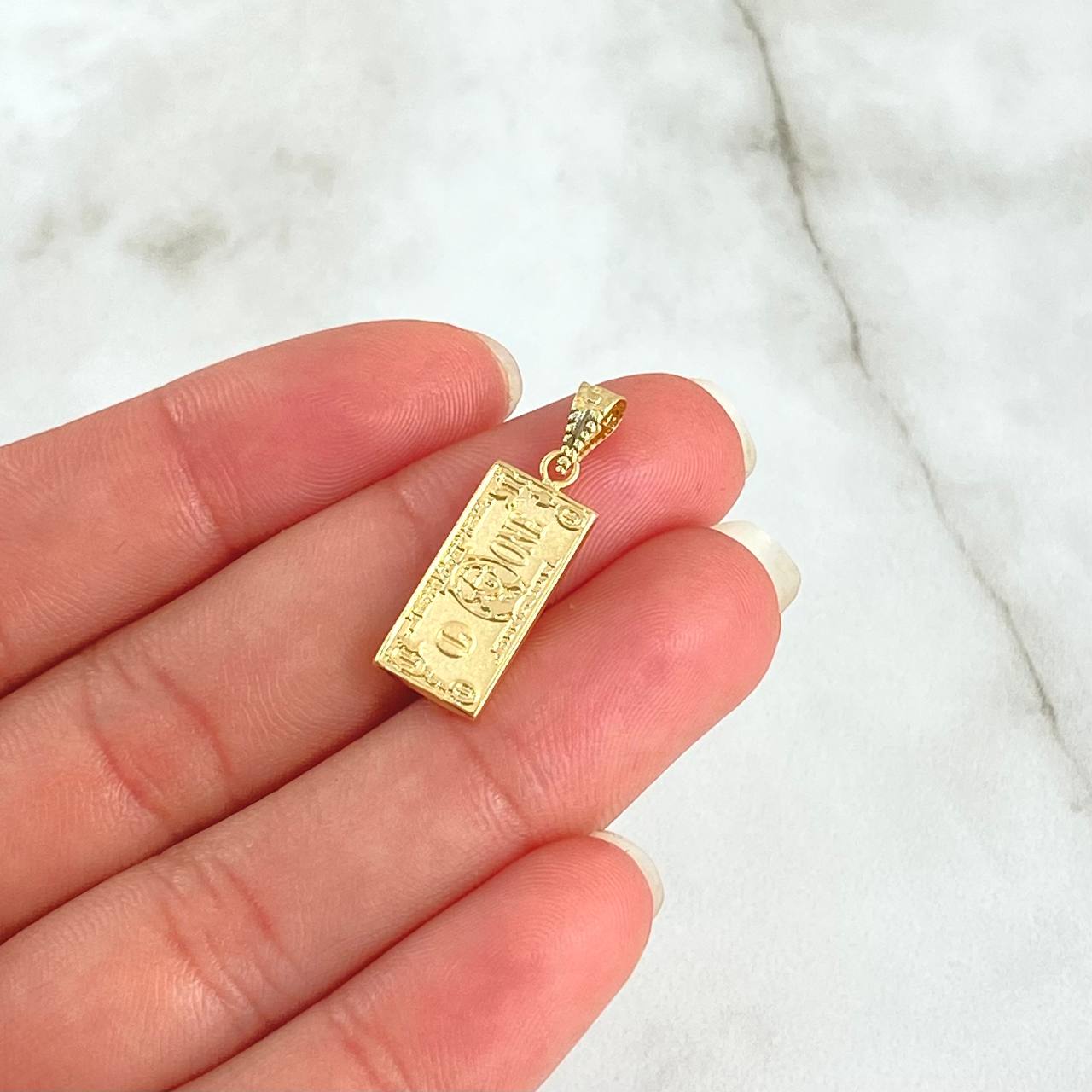 Dije Dólar 0.85gr / 2.2cm / Oro Amarillo 18K ©