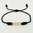 Pulsera Negra Trío Bolas 3und / 5mm Tres Oros 18K  (A.C)