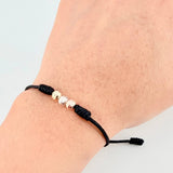 Pulsera Negra Trío Bolas 3und / 5mm Tres Oros 18K  (A.C)