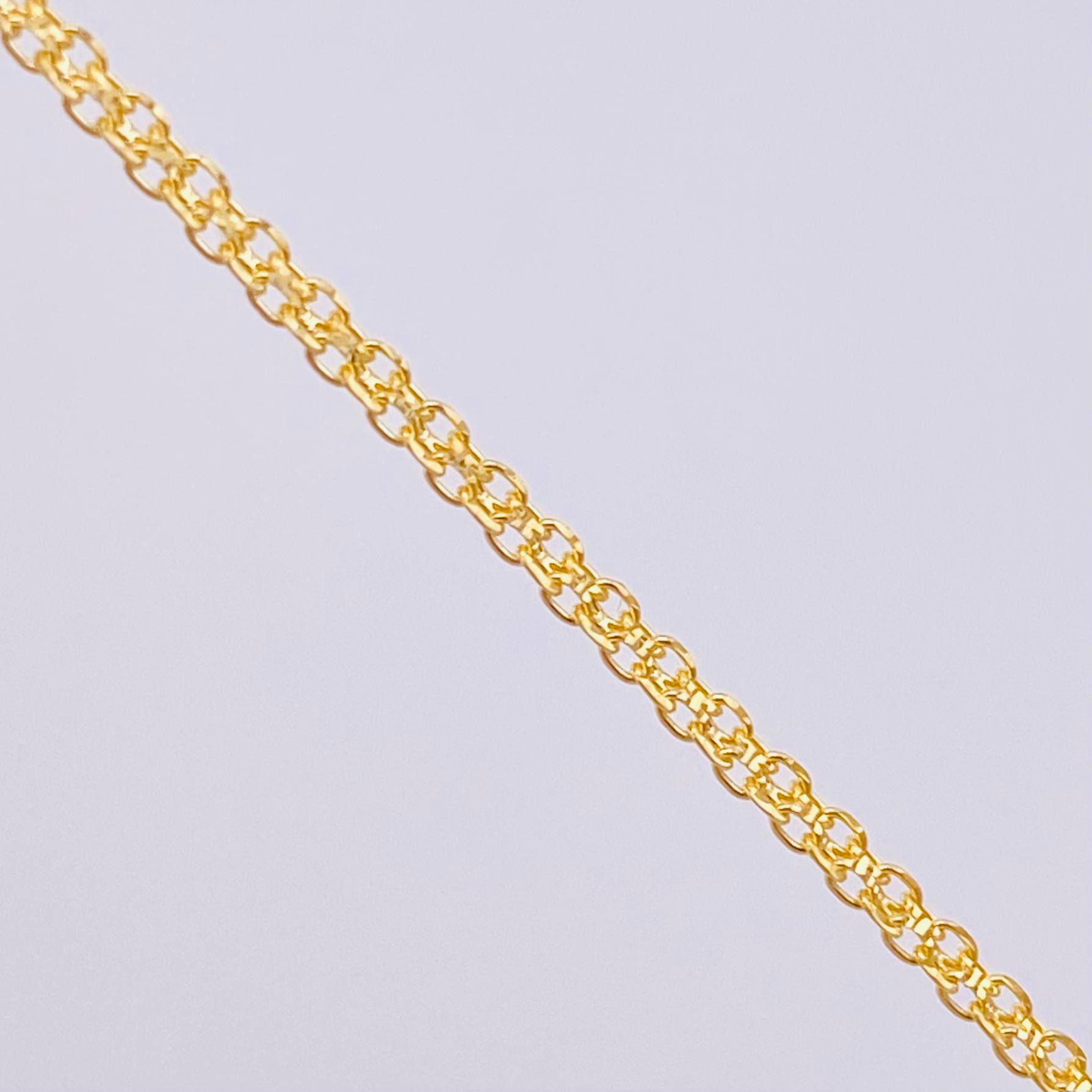 Cadena China 2.45gr / 17 3/4 in / 1.5mm Oro Amarillo +1 18K