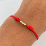 Pulsera Roja Bolas 3mm 3 Und Lisas Oro Amarillo 18K (A.C)