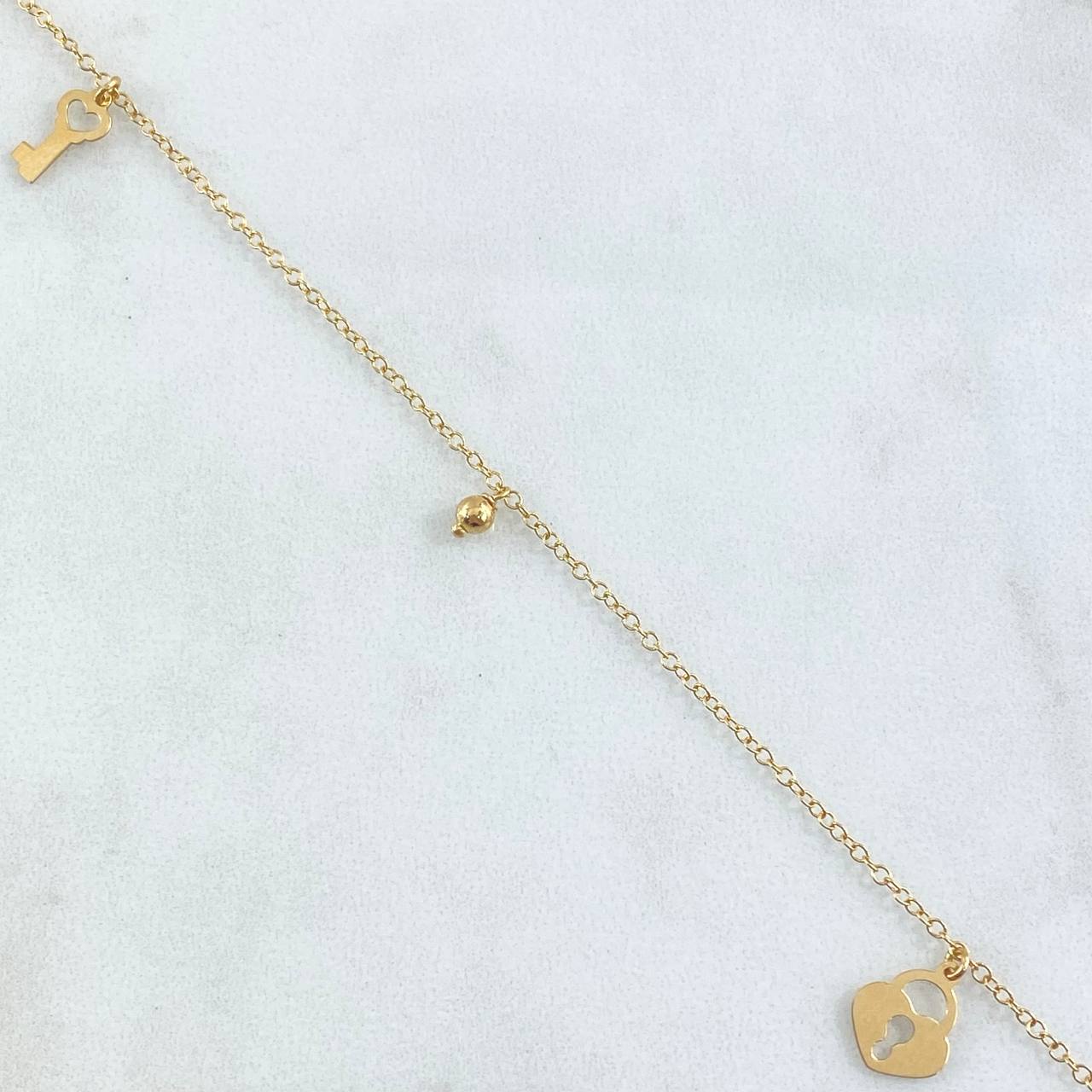Tobillera Aro Seguido Colgante Bolas 1.8gr / 24cm-25cm / 1.4mm Lisas 3mm Corazon-Llave Oro Amarillo +4 18K ©