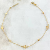 Tobillera Aro Seguido Estrella 2.1gr / 24cm-25cm / 1.4mm Bolas Lisas 3mm Oro Amarillo +4 18K
