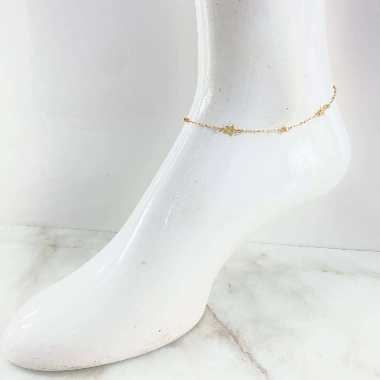Tobillera Aro Seguido Estrella 2.1gr / 23.5cm-25.5cm / 1.4mm Bolas Lisas 3mm Oro Amarillo +4 18K