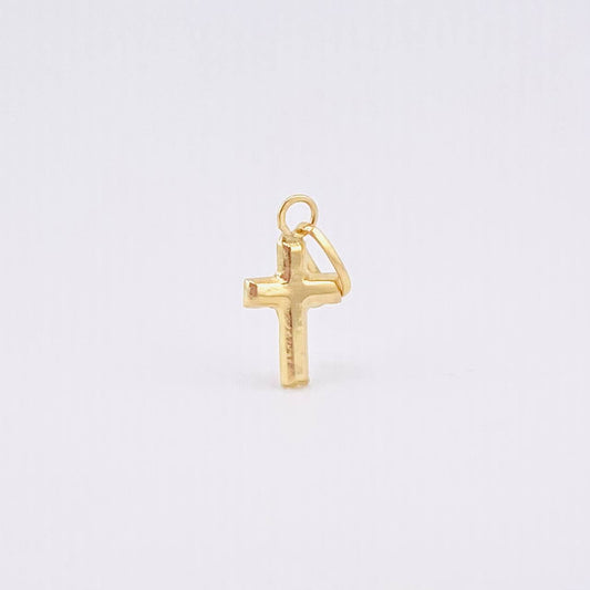 Dije Cruz Plana 0.15gr / 1/2 in / Oro Amarillo 18K ©