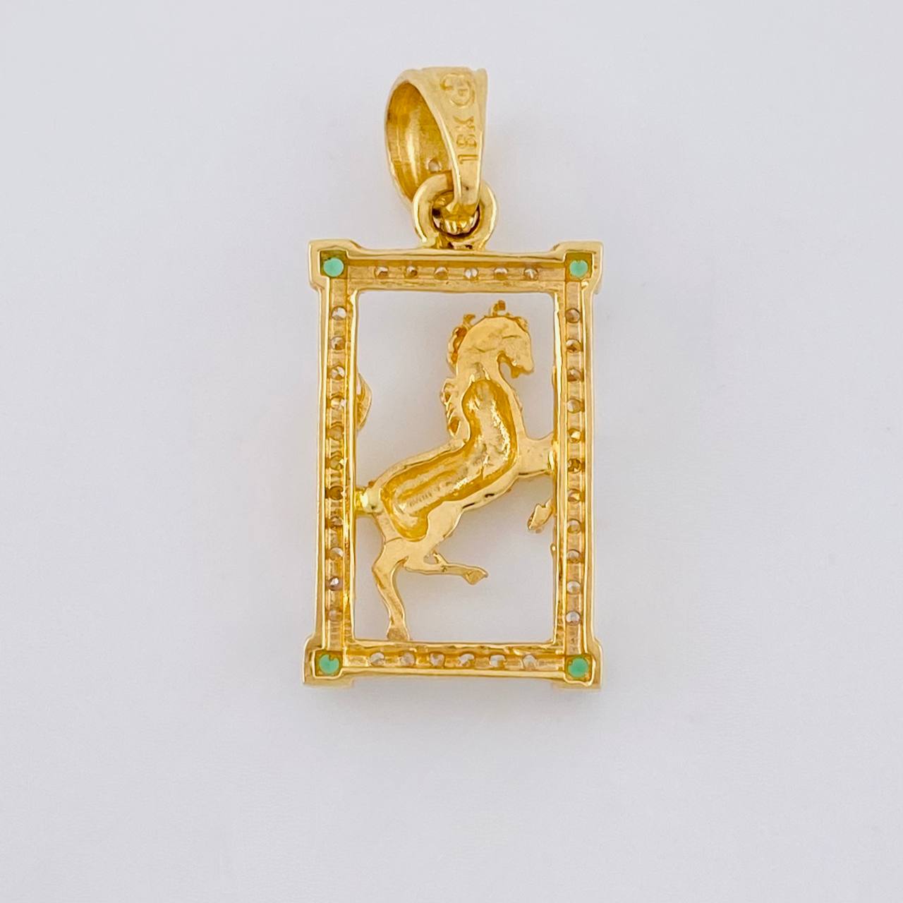 Dije Marco Caballo 2.35 g / 1 in Oro Amarillo 18K