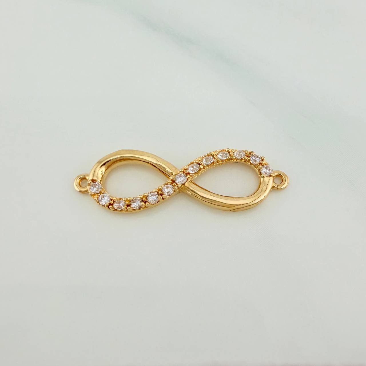 Herraje Infinito 1.55gr / 1 in / Oro Amarillo 18K &