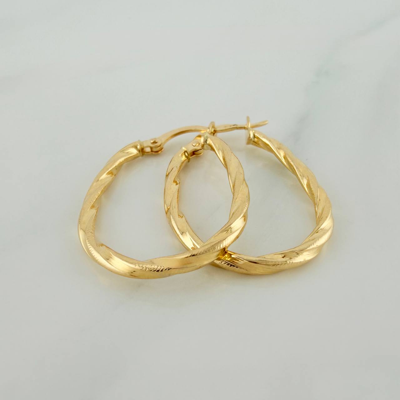 Candongas Nilo Ovaladas 1.5gr / 1 in / Oro Amarillo 18K &