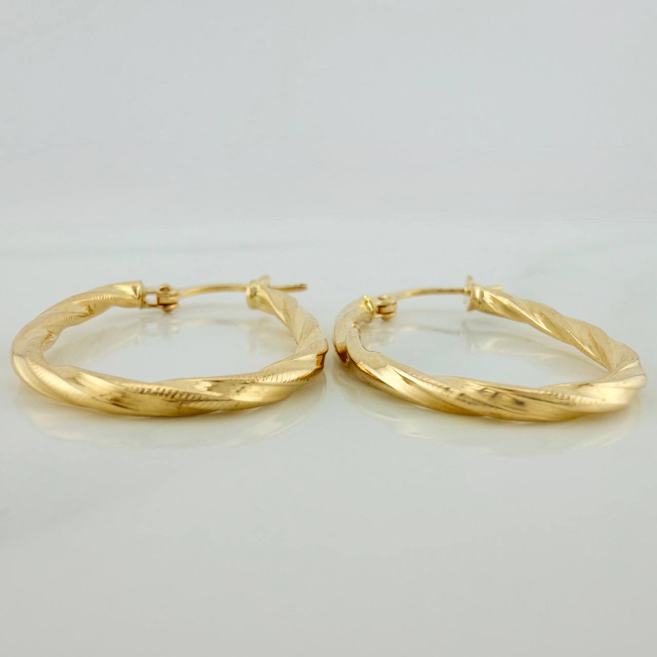 Candongas Nilo Ovaladas 1.5gr / 1 in / Oro Amarillo 18K &