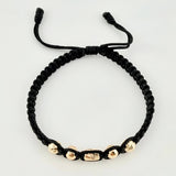 Pulsera Negra Cilindro Central 5und / 4mm-5mm Oro Amarillo 18K  (A.C)