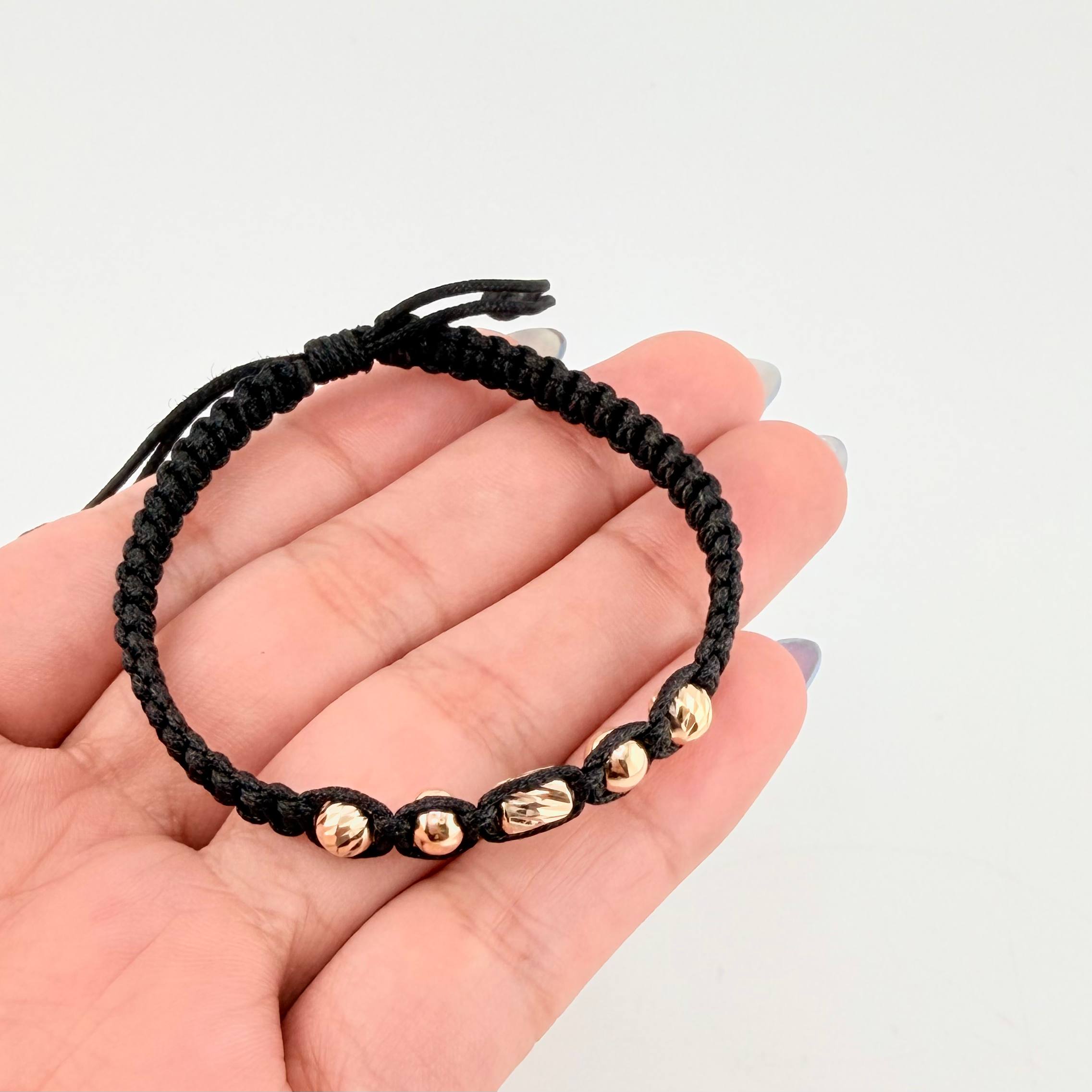 Pulsera Negra Cilindro Central 5und / 4mm-5mm Oro Amarillo 18K  (A.C)