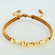 Pulsera Dorada Cilindros Interceptos 7und / 4mm-5mm Oro Amarillo 18K  (A.C)