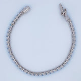 Pulso Tenis 16.85gr / 20.3cm / 4.7mm Circones Azules Oro Blanco 18K $