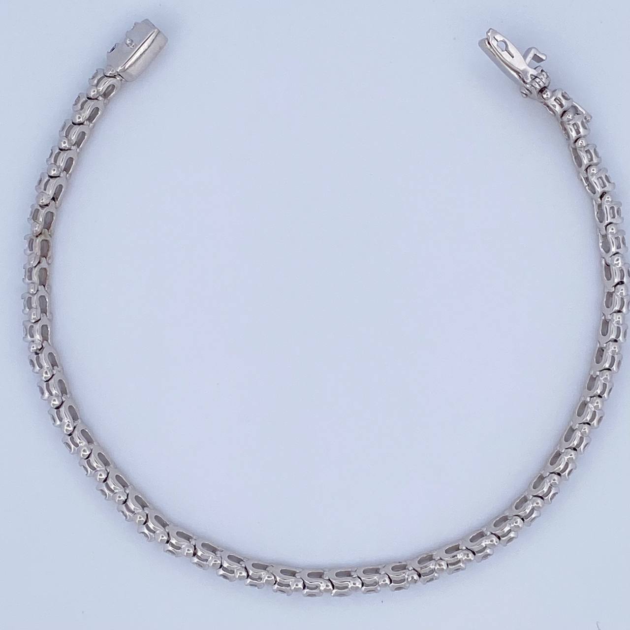 Pulso Tenis 12.9gr / 19cm / 4mm Circones Blancos Oro Blanco 18K $