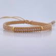 Pulsera Beige Herraje Cilindro 1.65gr / Circones Blancos Oro Amarillo 18K &