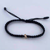 Pulsera Negra Herraje Cilindro 0.4gr / Circones Blancos Oro Amarillo 18K &