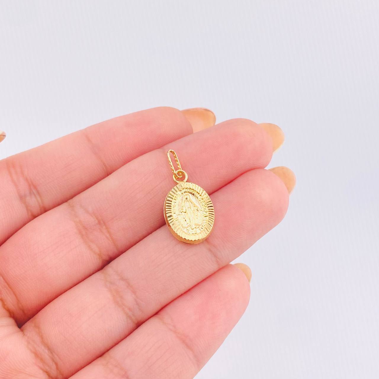 Dije Milagrosa 0.85gr / 3/4 in / Oro Amarillo 18K *