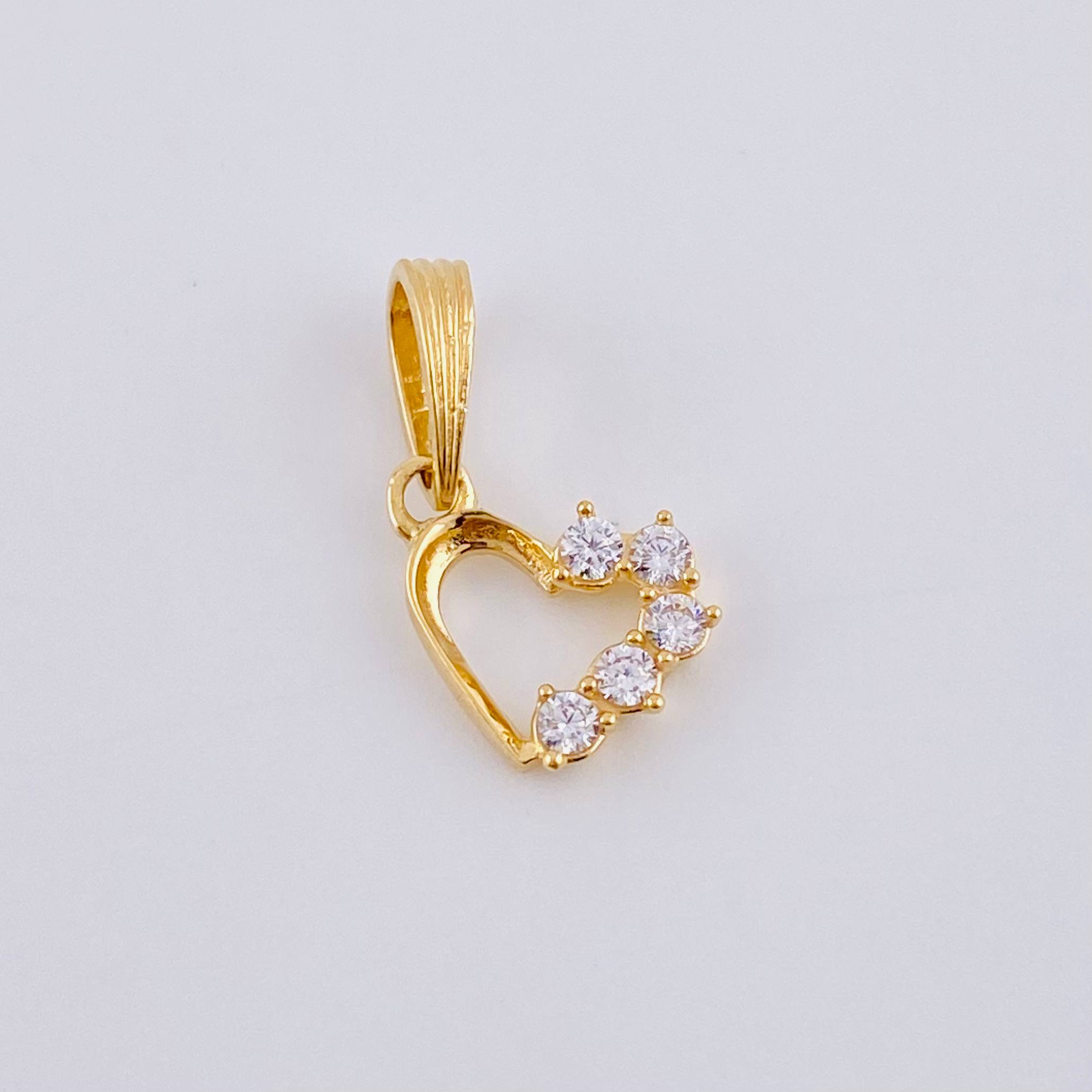 Dije Corazon Silueta 0.7 g / 1/2 in Oro Amarillo 18K
