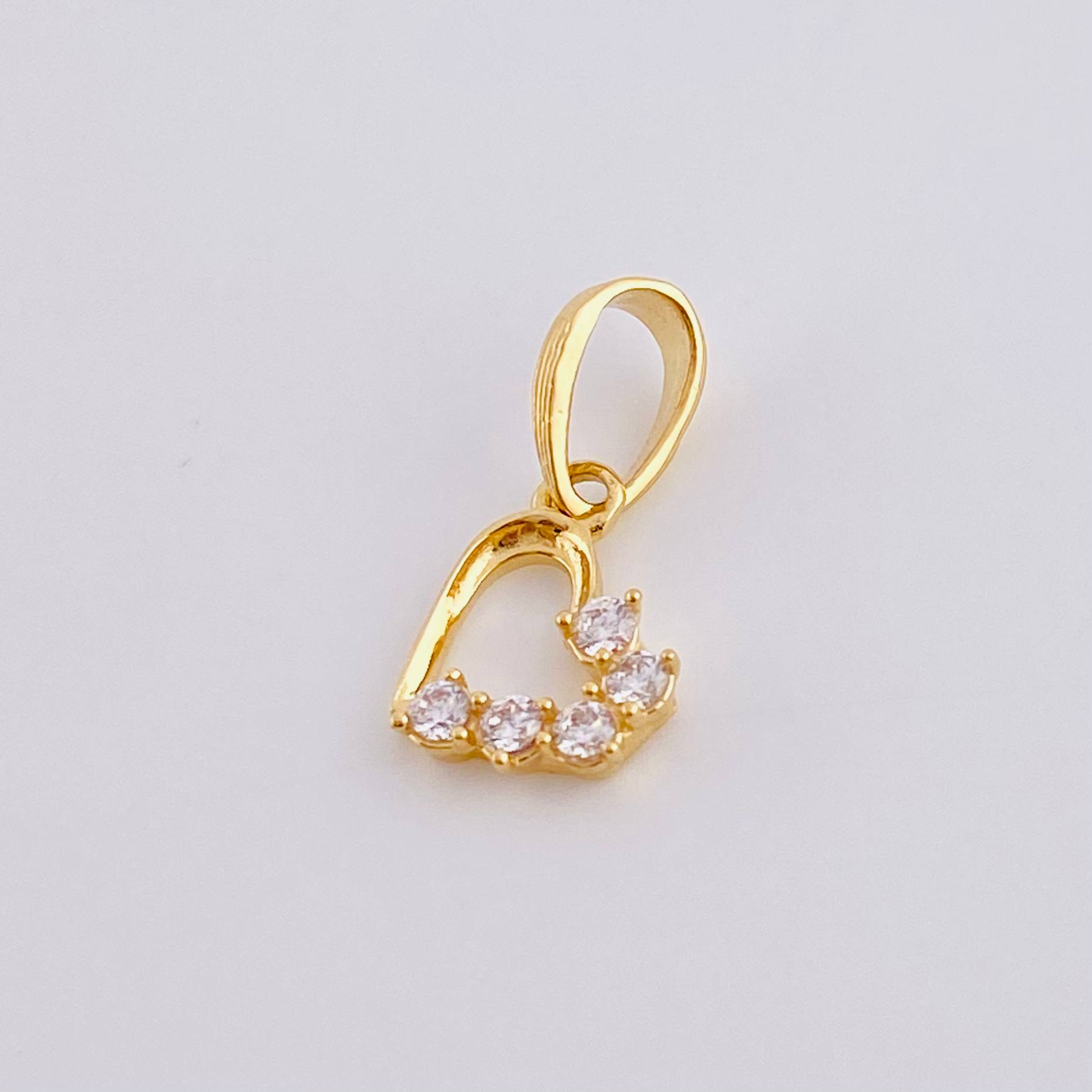 Dije Corazon Silueta 0.7 g / 1/2 in Oro Amarillo 18K