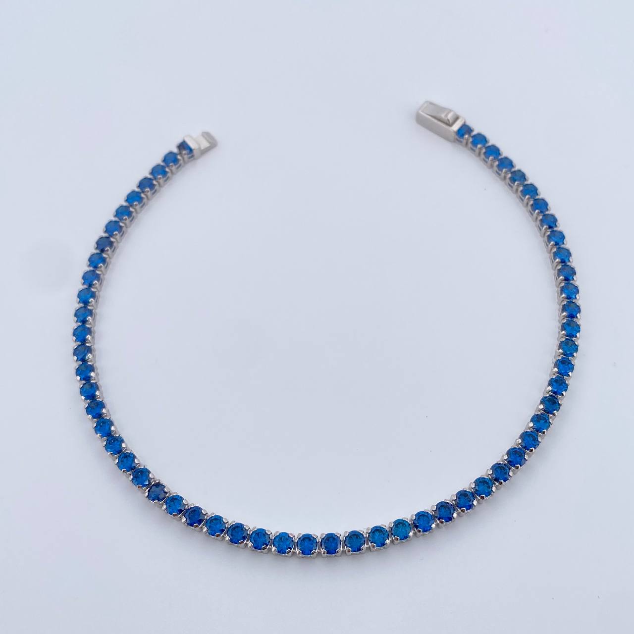 Tennis Bracelet 5.9gr / 7.5in / 1.3mm Blue Zircons White Gold +4 18K &