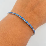 Tennis Bracelet 5.9gr / 7.5in / 1.3mm Blue Zircons White Gold +4 18K &