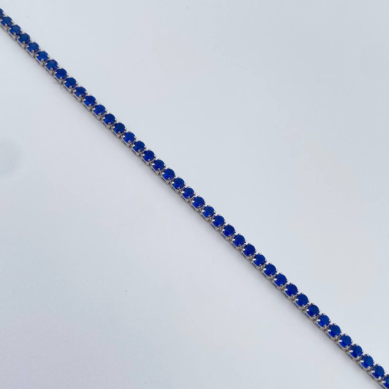 Pulso Tennis 2.35gr / 19cm / 0.3mm Circones Azules Oro Blanco +4 18K $
