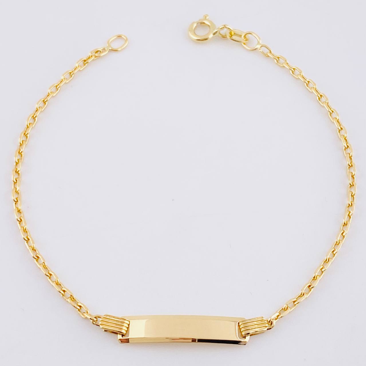 Pulso Aro Seguido Placa Rectangular Curva 1.55gr / 6 in / 1.7mm Oro Amarillo +3 18K ©
