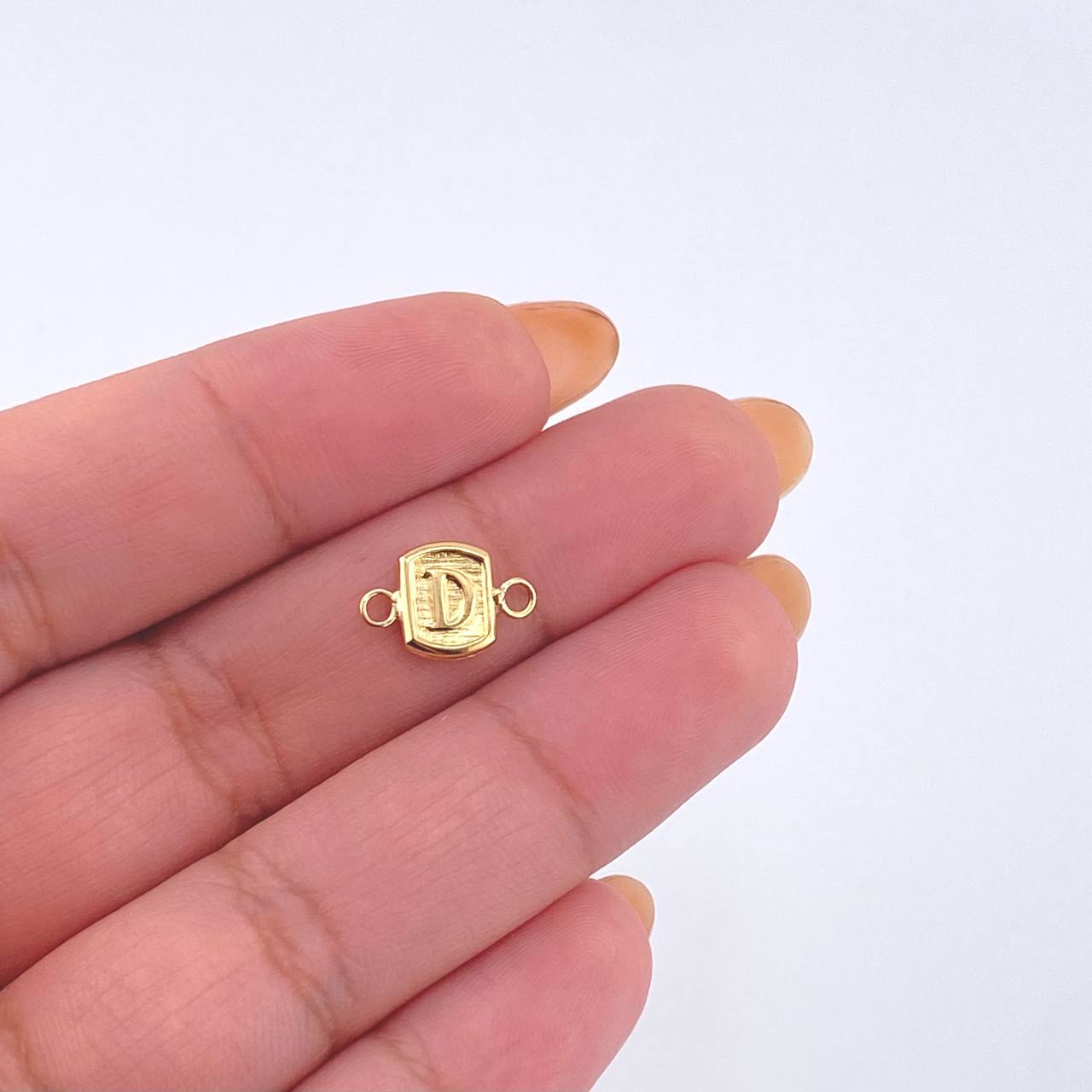 Herraje Letra D 0.3gr / 1/2 in / Oro Amarillo 18K