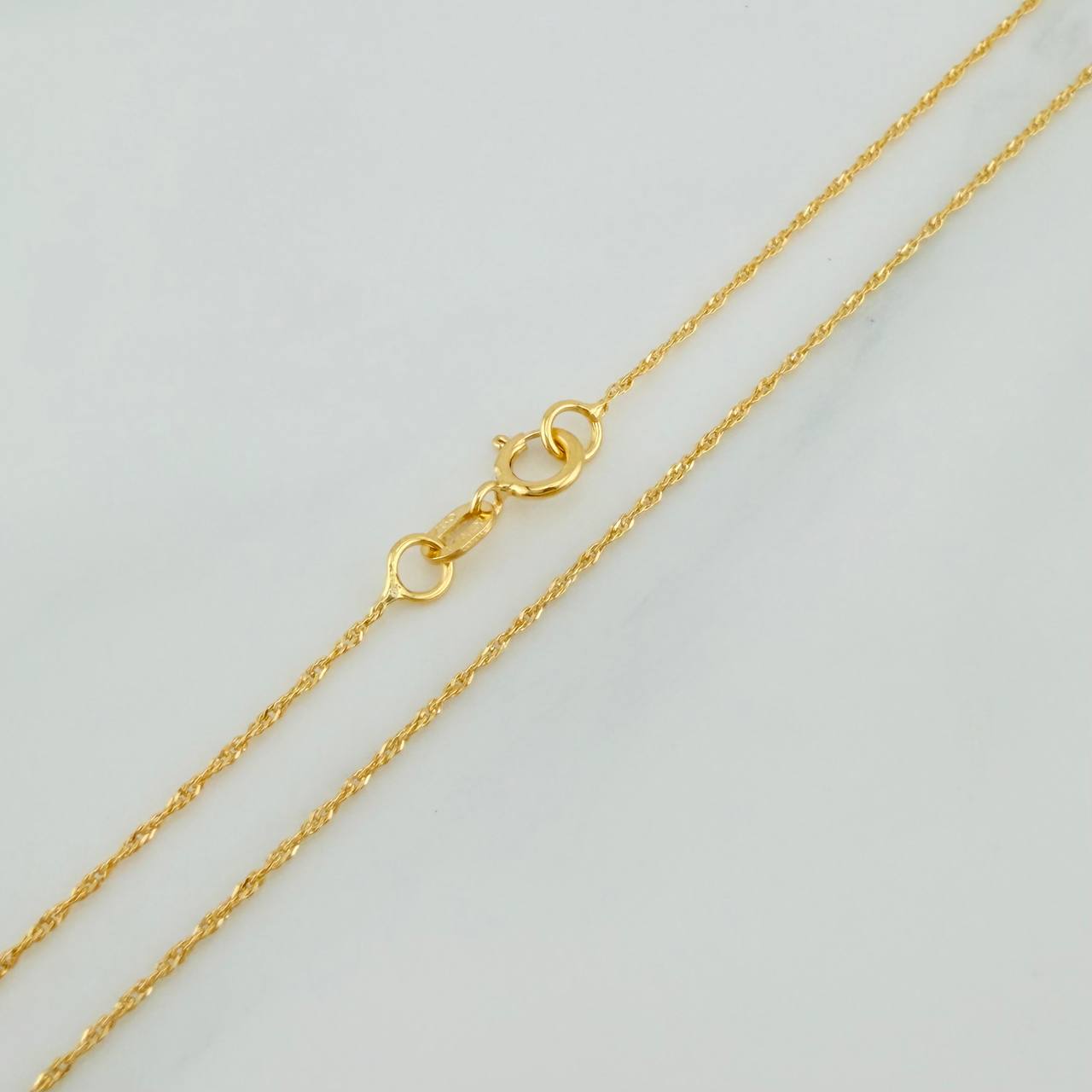 Cadena Singapur 0.85gr / 15 3/4 in / 0.5mm Oro Amarillo +3 18K &