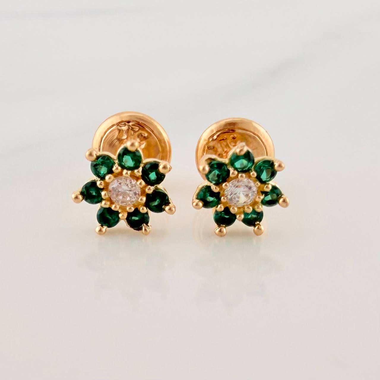 Topos Flor 0.85gr / 6.3mm Oro Amarillo 18K %