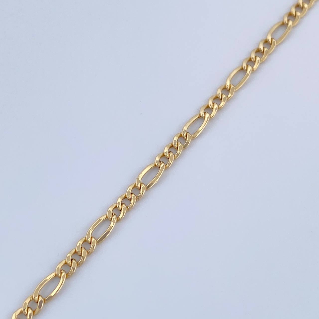 Figaro Bracelet 1.15gr / 7.6in / +1 18K Gold &