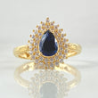 Solitaire Halo Teardrop Ring 4.05gr / Size 7 1/2 / 18K Yellow Gold ©